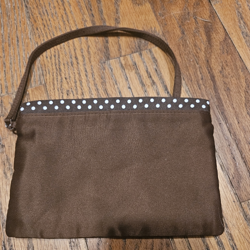 Henri Bendel Wristlet brown with white polka dots on top. NWOT